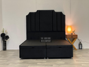 Black plush ottoman storage panel gas lift bed base